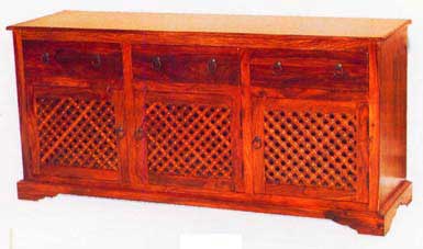 The cabinet tinged with East Indian charm by Handicrafts.