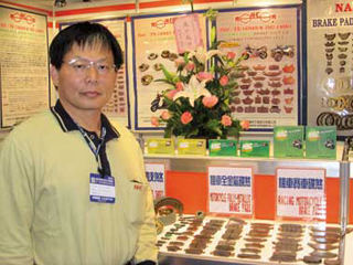 President Fred Cheng and some of Nan Hoang`s friction-material products.