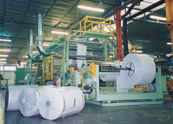 Tandem extrusion laminator developed by Sencar.