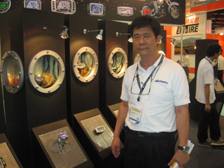 Acewell president George Lee and his company`s top-end weatherproof PTW meters.