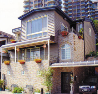 Attractive house built of PU foamed boards supplied by Chang Shing.