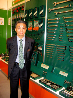 Joseph Liao, president of Jonnesway, stands by his company`s high-end, professional Jonnesway auto tools.