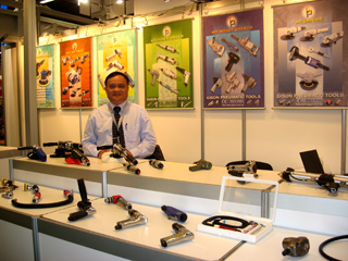 Canny Lin, general manager of Gison, and his company`s famous GP-brand air tools.
