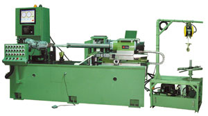 Car-axle-assembly balancing machine.