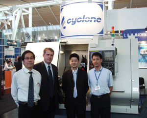 L&W management team with one of its self-developed machining centers.