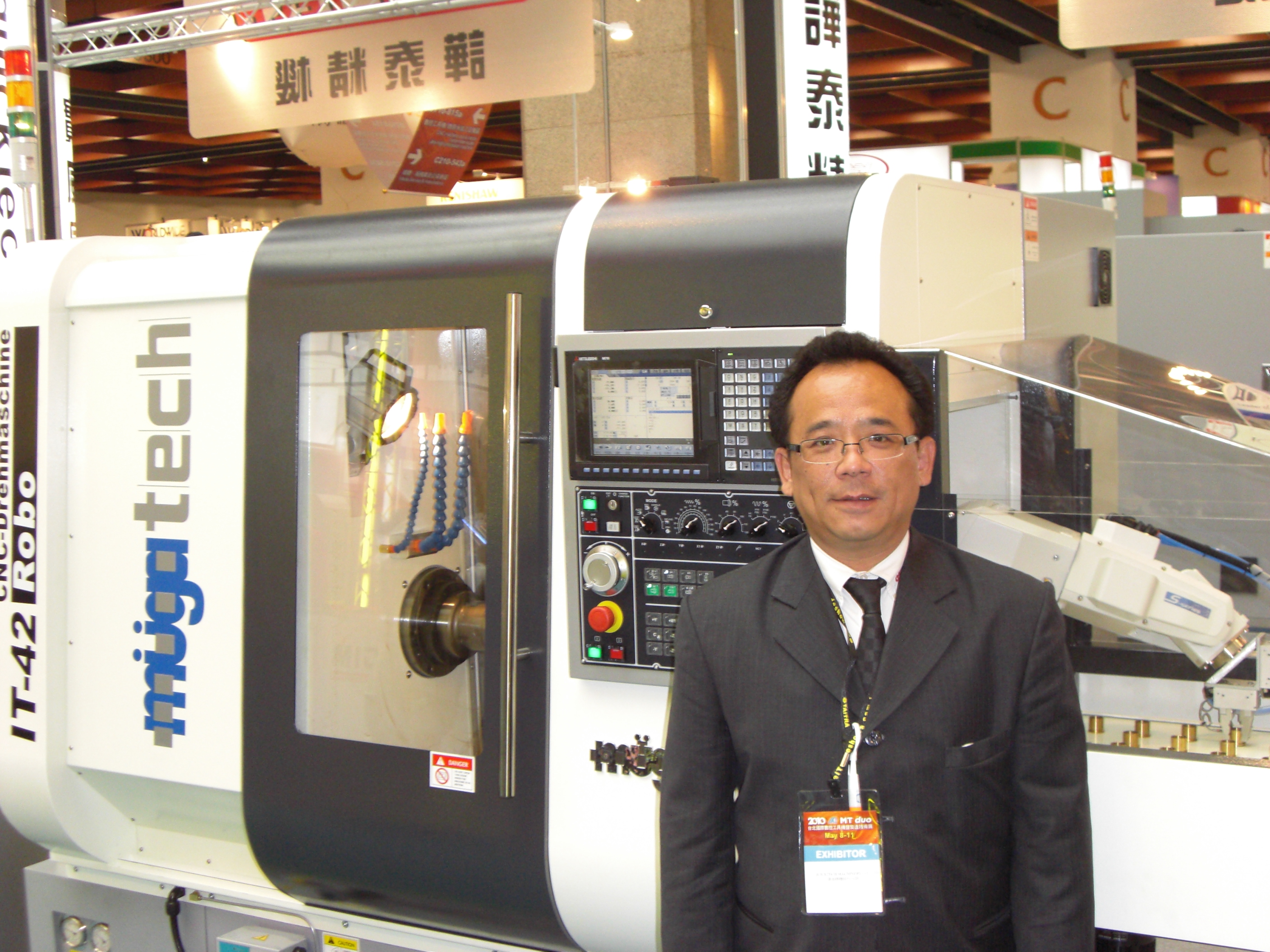 Jacky Hung of Quick-Tech explains the unique functions of his company`s latest CNC lathe.