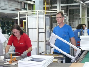 Workers busy assembling steel kitchen modules in Bertolini’s plant.