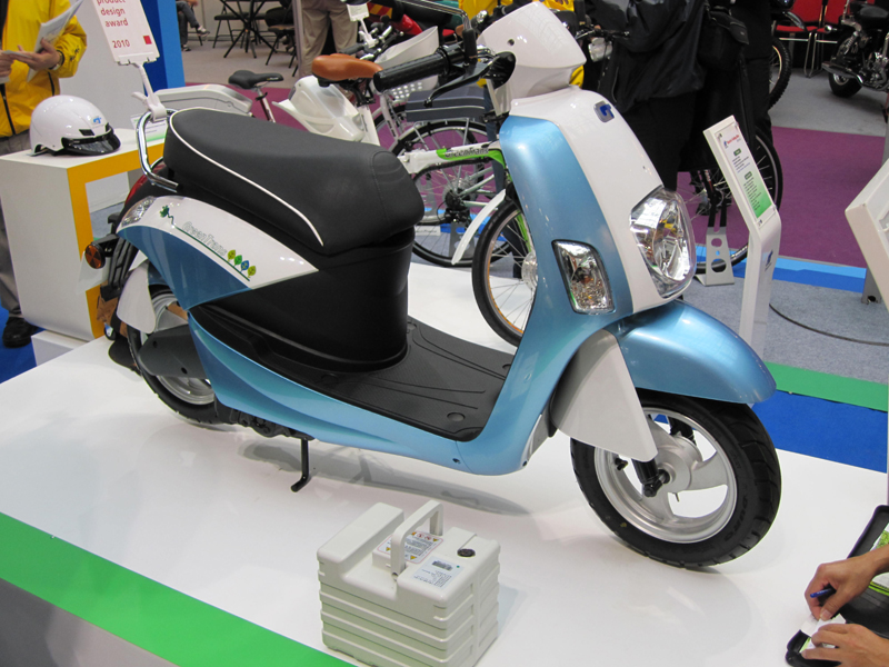 China Motor Corp.`s e-moving scooter has a portable lithium-ion battery pack.