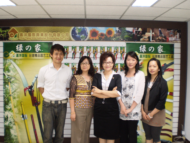 Lucy Lin (center) and marketing staff at Charming Young.