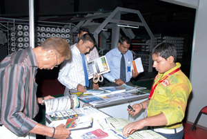 Visitors browse CENS publications at 3P—Plas Print Pack Pakistan 2010.