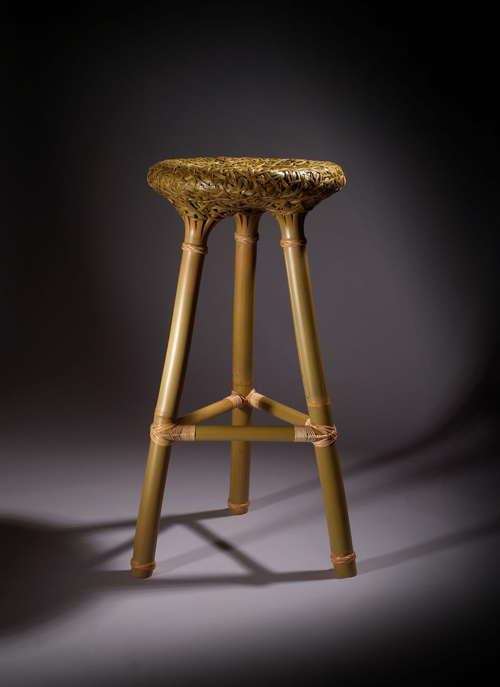 This bamboo barstool exhibits simple styling.