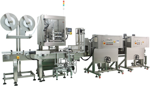 Auto label/tamper evident sleeving machine.