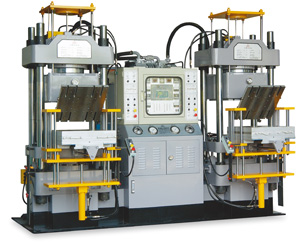 Vacuum type oil hydraulic molding machine.