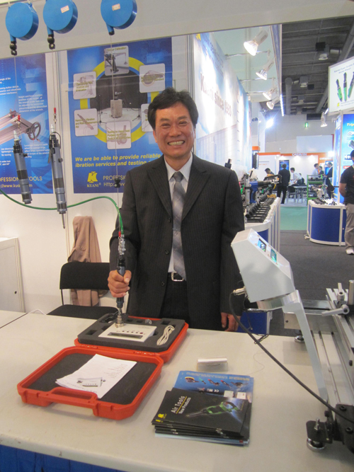 Harry Cheng, general manager of Kuani, shows his company`s torque meters for air tools and torque wrenches.