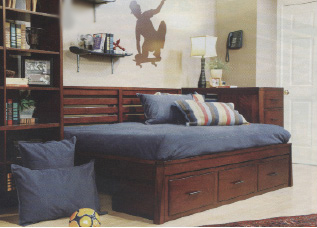  Kendall, from Opus Designs by Hooker, offers urban casual appeal with a rustic touch in a medium-brown cherry finish. This setting features a full-size daybed with trundle storage below with a bunching dresser and tall bookcase as piers, to minimize floor space.