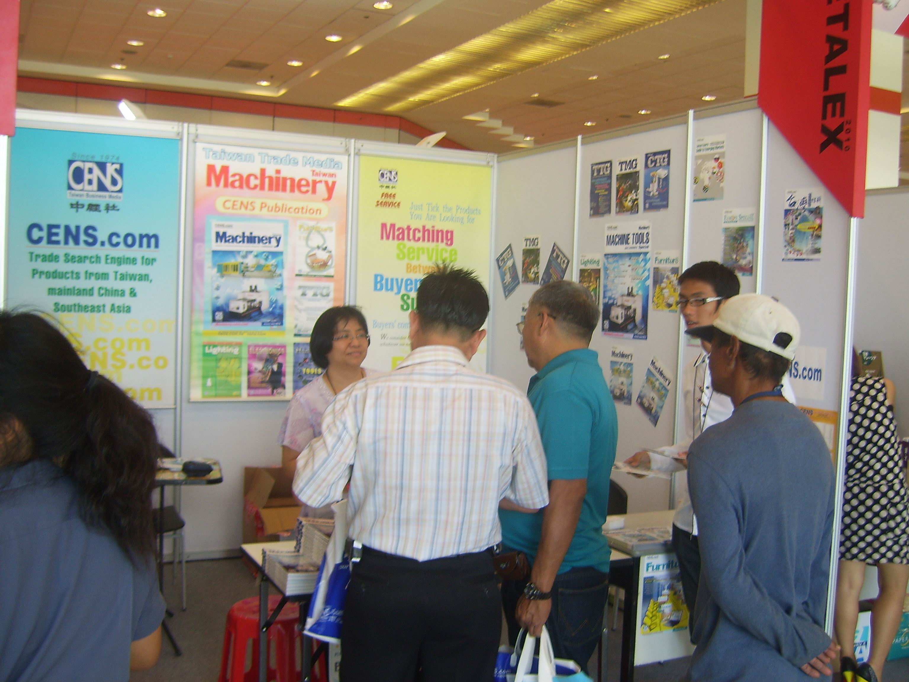 Visitors browse CENS publications at Metalex Thailand.