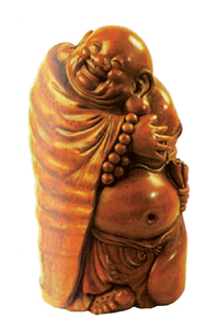 The bamboo-engraved “Happy Buddha” statue.