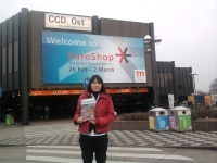 CENS representative in front of EuroShop exhibition hall.