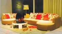 Zhejiang Kuka Technics Sofa embraces arc design for its sofa and end table.
