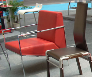 Supported by a sleek chromed steel frame, Euro American’s scarlet casual chair is designed to look bright and cheerful.