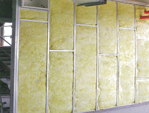 Glass fiber wool helps make Universal Cement’s gypsum panels a superb nonflammable building material. 