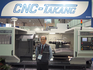CNC Takang’s technical director C.C. Chen with the LB40x1200 heavy duty CNC lathe.
