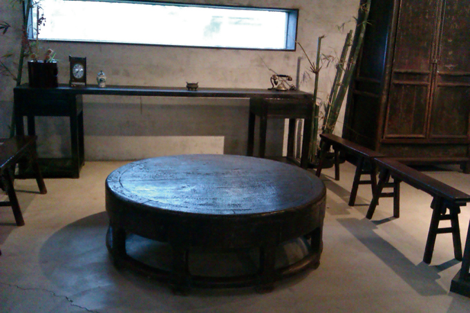 This large round table has a unique shape that contrasts sharply with the squire look of classic Chinese furniture.