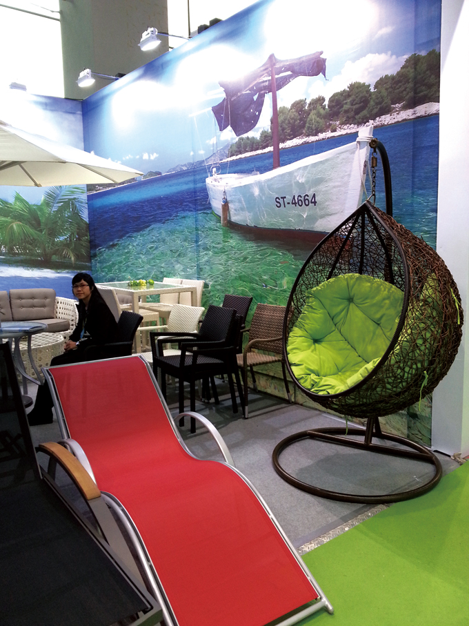 Various outdoor furniture items are showcased at 2013 China International Furniture Fair (Guangzhou).