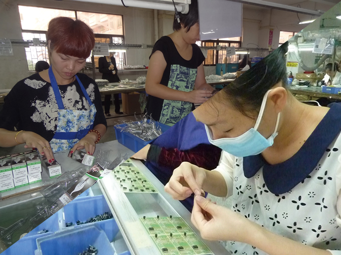 LED lighting has a promising future (workers at Gaoya are busy assembling LED lamps).