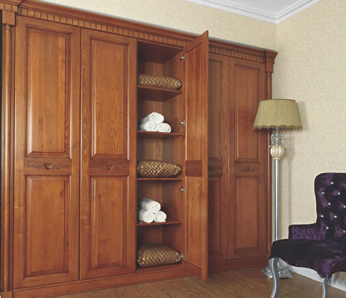 The wooden wardrobe closets developed by HuaZhang have a simple and natural look.