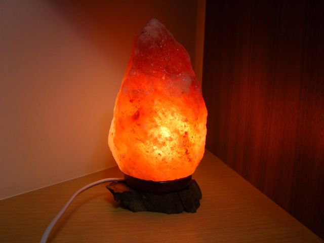 The Rose Salt Crystal Lamp by Advance Jewel Group emits a rosy glow, a soft light which creates a warm and romantic atmosphere.