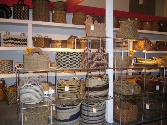 ATP uses locally-grown wicker, water hyacinth, and coco sticks to weave a wide variety of baskets, jars, bowls, and bins.