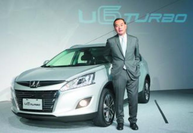 Yulon Group chairman Kenneth Yen, and his group's own-branded Luxgen U6 crossover. (photo from UDN)