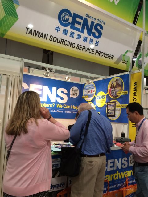 Visitors browse CENS publications at National Hardware Show.