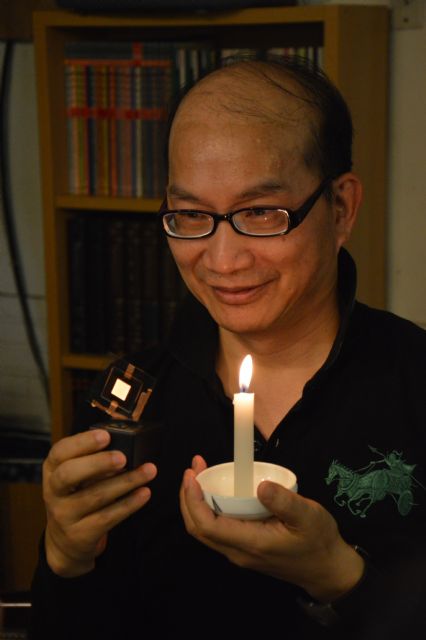 Pro. Jwo-huei Jou compares the OLED (left) with a candle. 