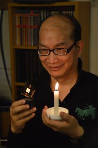 Pro. Jwo-huei Jou compares the OLED (left) with a candle. 