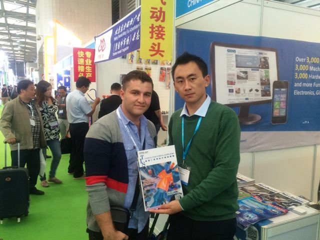 CENS representative (right) with a foreign buyer at PTC Asia.