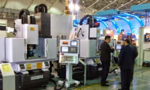 Taiwan's machinery exports decline a second month in April due to currency exchange turbulence. (a machinery trade show shown)