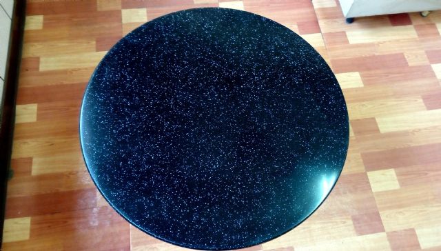 A tabletop made of Delta's artificial stone board. 