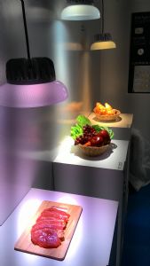 Lustrous's Bartender LED modules in lighting fixtures project vivid lighting effect on merchandise like food. 