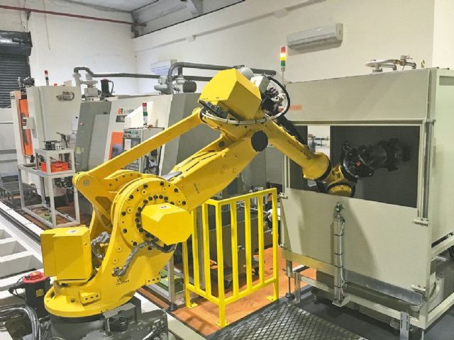 Automating production with robots is regarded by Taiwan’s major manufacturing companies as a savvy strategy against rising local labor cost (photo courtesy of UDN.com). 