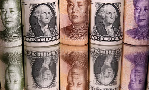 人民幣仍在努力追趕美元的全球準備貨幣地位。圖檔來源：聯合報系／路透
