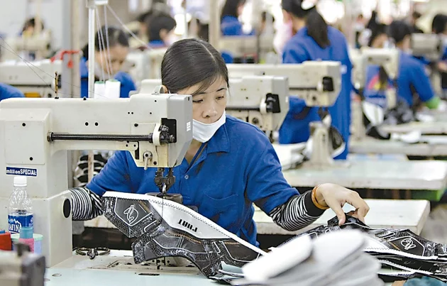 FIle photo of a shoemaking factory production line. Photo credit: UDN/Reuters