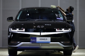 現代汽車（Hyundai）的電動車大賣，估計今年第1季的營業利益將超越三星電子。 路透