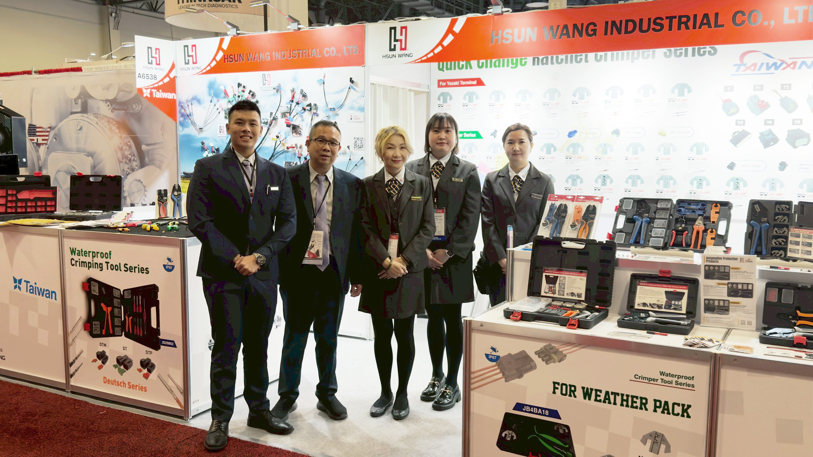 Chairman Li You-Hsin and General Manager Lisa Hsiao lead the team in showcasing Hsun Wang's innovation in precision crimping tools.