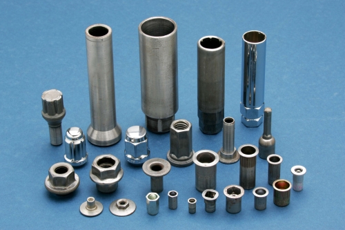 Products made of six dies long stroke nut formers and tube formers