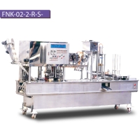 AUTOMATIC FILLING AND SEALING MACHINE