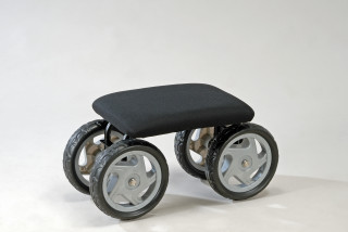 Garden cart with padded seat on wheels Garden cart with padded seat on wheels