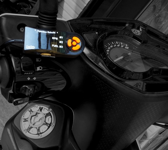 Programmable fuel injection with over-rev limiter