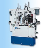 Rotary type four-station grinding machine